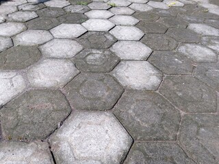 honeycomb tiles background. abstract background. hexagon. paving blocks. stone pavement texture
