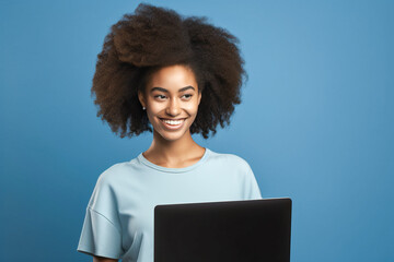 Young happy afroamerican woman using laptop device isolated on blue background. Smiling female model user holding computer presenting advertising job search or shopping website. Generative AI
