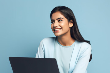 Young happy latin woman using laptop device isolated on blue background. Smiling female model user holding computer presenting advertising job search or shopping website. Generative AI - obrazy, fototapety, plakaty