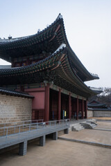 Fototapeta na wymiar Changdeokgung Palace and Donhwamun main gate and entrance in Seoul during winter morning at Jongno , Seoul South Korea : 3 February 2023