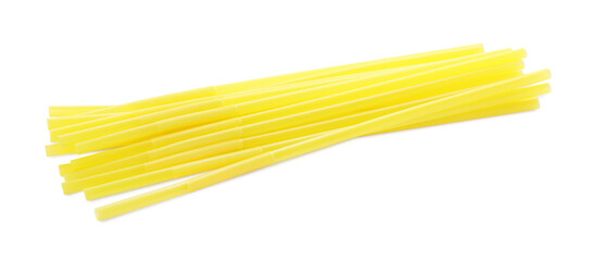 Yellow plastic cocktail straws on white background