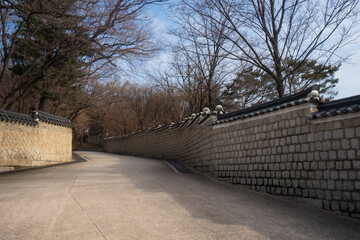Changdeokgung Palace and walkway to Secret Garden or Huwon during winter morning at Jongno , Seoul South Korea : 3 February 2023