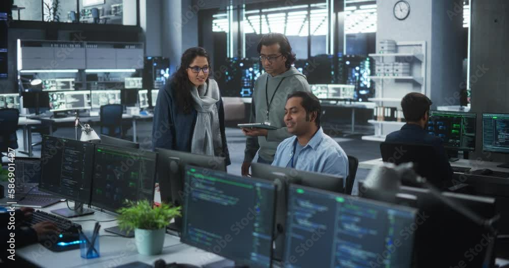 Leinwandbilder Team of Three Young Indian Software Engineers Use Computer to Discuss a Technological Project in Modern Industrial Office. Male and Female Scientists High Five and Celebrate Successful Test Result