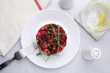 Delicious vinaigrette salad on light grey table, flat lay