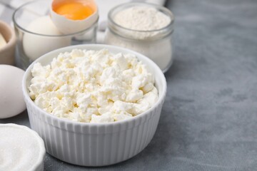 Different ingredients on light grey table, closeup and space for text. Cooking cottage cheese pancakes