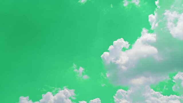 The green screen of moving white clouds with 4K resolution. Can use to change the background color.	
