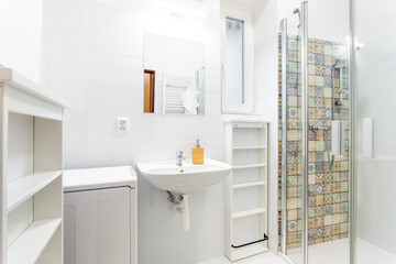 a bathroom in an apartment of a residential building
