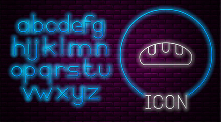 Glowing neon line Bread loaf icon isolated on brick wall background. Neon light alphabet. Vector