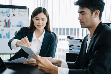 Fototapeta premium Project manager working and update tasks with milestones progress planning and professional investor working new start up project in the office.