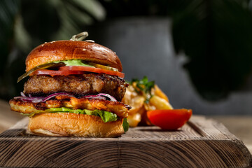 Cheeseburger with beef patty and chicken patty