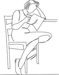 girl sitting on a chair and reading