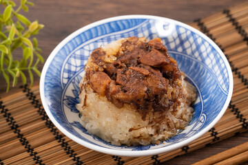 Migao, tube rice cake, rice pudding in a bowl, delicious Taiwanese street food.