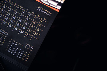 Calendar on a black background with a place for the inscription. Case planning