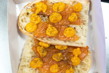Marinated salmon toast. Food concept.