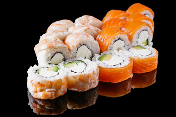 sushi roll with shrimp Ebby cream cheese Philadelphia avocado cucumber on a black mirror background