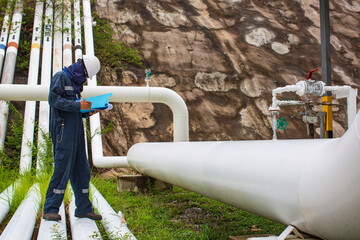 Male worker inspection visual pipeline oil and gas corrosion  tube steam pipeline