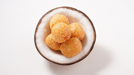Thai dessert stuffed with fried mung beans (Khai Hong dessert) fried mung bean filling  in coconut shell