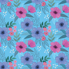 Beautiful blooming flowers design on blue color background seamless pattern. Can be used for fabric textile wallpaper.