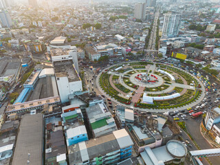 City building with transport road aerial view