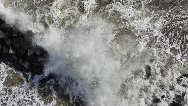 Elmer beach breakwater. Bognor Regis. South of England. Cinematic drone flight