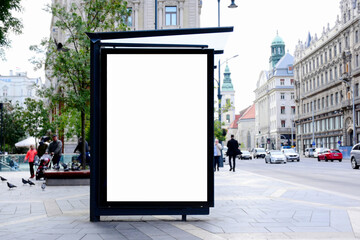 bus shelter at a busstop. blank billboard ad display. empty white lightbox sign. urban street...