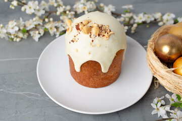 Traditional Easter cake with nuts on gray background