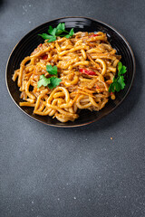 noodles with vegetables tomato sauce ready to eat healthy meal food snack on the table copy space food background rustic top view veggie vegan or vegetarian food no meat