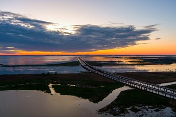 Mobile Bay and interstate 10 bridge at sunset in March