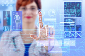Doctor's hand pointing at Futuristic Holographic Interface, showing medical Data in augmented...