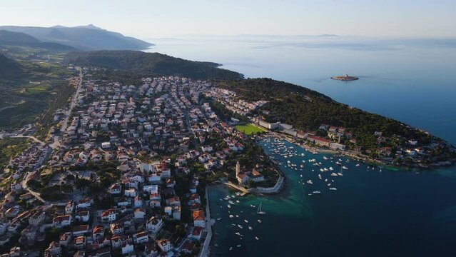 Hvar old town on island Hvar in Croatia, Dalmatia in Adriatic sea. Summer vacation destination. Aerial view. 4k drone video