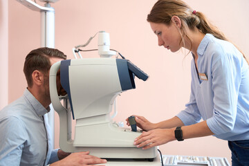 Qualified specialist is examining visual acuity in the medical clinic