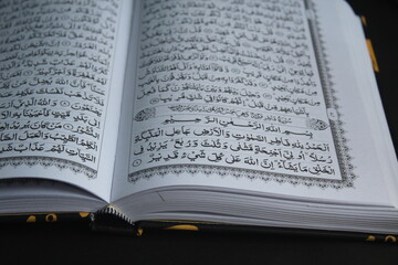 Fototapeta na wymiar the part in the Koran which contains the verses of the holy verses 