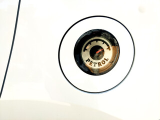 a closeup picture of petrol indicator of a car