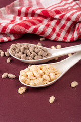 Roasted Crunchy Jowar and ragi - Indian Dietary Supplement, served in a bowl over moody background, selective focus.