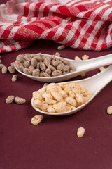 Roasted Crunchy Jowar and ragi - Indian Dietary Supplement, served in a bowl over moody background, selective focus.