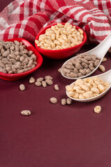 Roasted Crunchy Jowar and ragi - Indian Dietary Supplement, served in a bowl over moody background,...