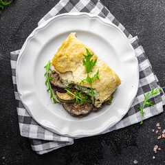 casserole vegetable lasagne eggplant, zucchini, green peas, cheese, bechamel sauce vegetables meal food snack on the table copy space food background rustic top view