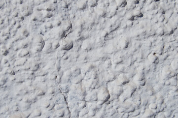 background with a rough white wall 