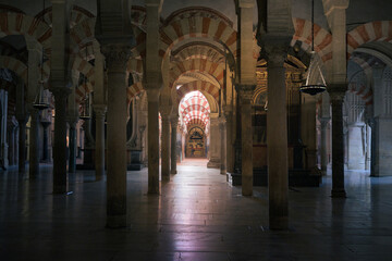 Arches and columns of the Mosque-Cathedral of Cordoba, Andalusia, Spain.