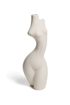 Close-up shot of a white empty ceramic female body shaped vase with a narrow neck isolated on a white background. Modern home decor element. Front view.