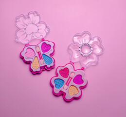 Children's set of decorative cosmetics for a little girl. Flat lay.