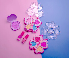 Children's set of decorative cosmetics for a little girl. Flat lay.