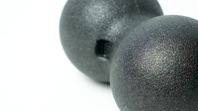 Double back massage ball, myofascial release, back muscle relaxation, self-massage.