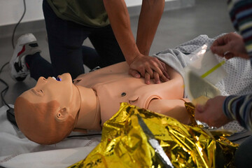 Emergency medicine students attends a circumstantial emergency simulation course led by two...
