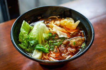 A bowl of delicious and rich Taiwanese braised beef noodles