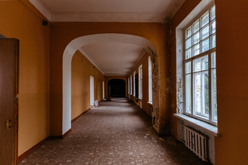 Dark dirty corridor of old abandoned school
