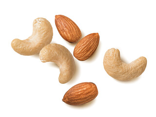 Flying cashew and almond nuts isolated on white background. Top view
