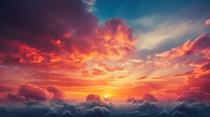 Obraz premium The Background_of_colorful_sky_concept_Dramatic_sunset_with_ portrays the mesmerizing beauty of a sunset with an explosion of colors in the sky. The sun is depicted as a fiery red ball of light, surro