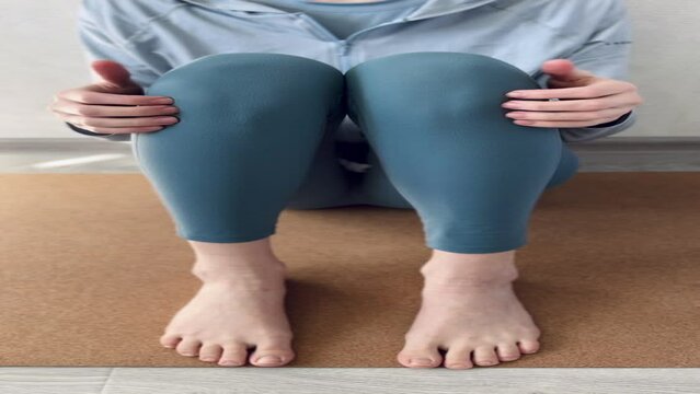 Woman doing tapping on shin below knees