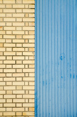 brick wall and blue metal door